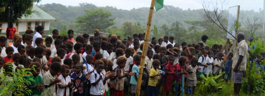 Itiki school children and teachers welcome delegates to launch of solar system